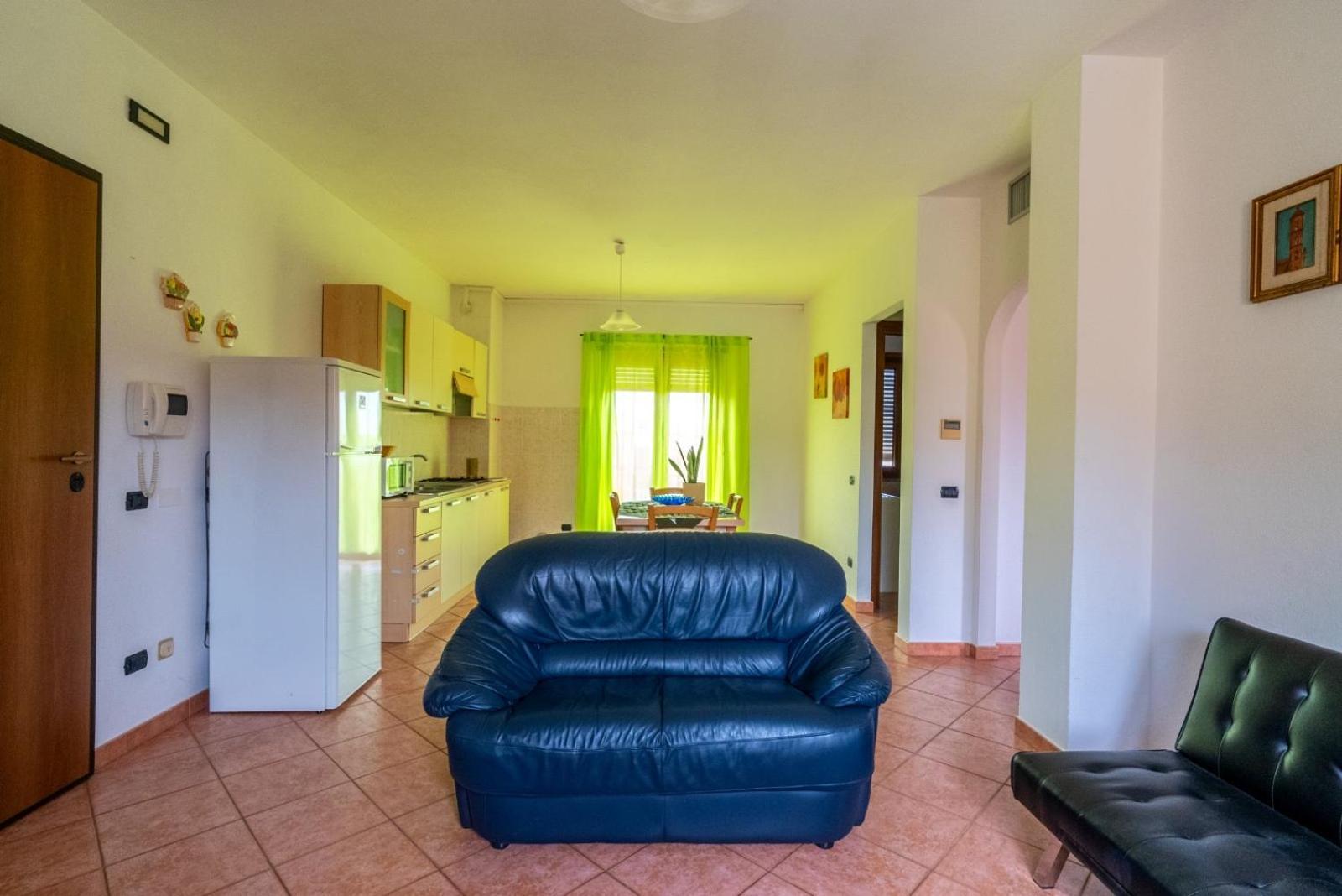 Appartamento In Centro ตอร์โตลี ภายนอก รูปภาพ