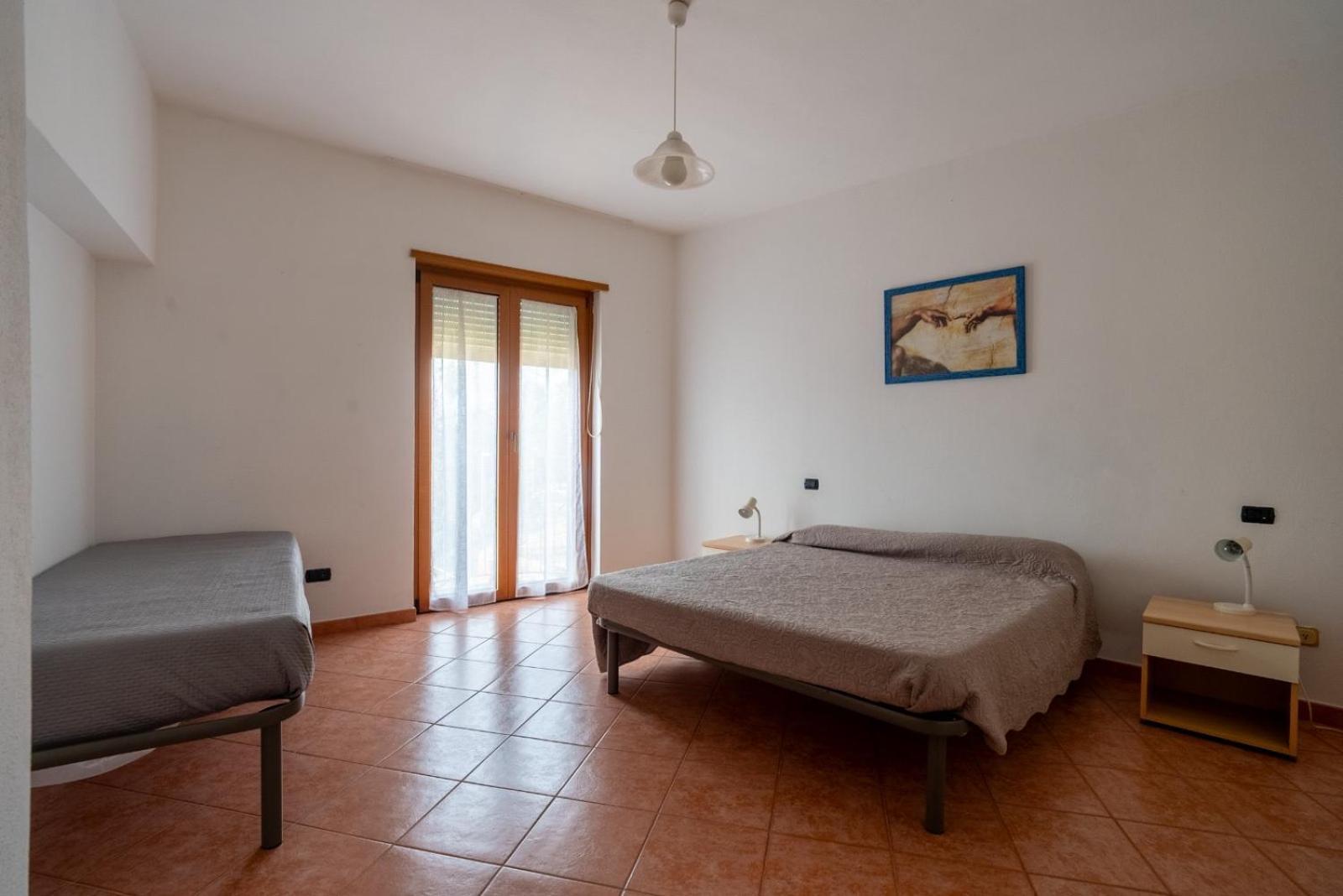 Appartamento In Centro ตอร์โตลี ภายนอก รูปภาพ